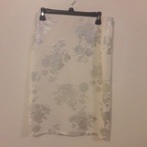 White knee length skirt